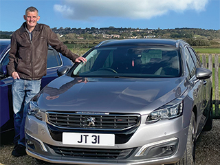 John Tyler with the number plate JT 31